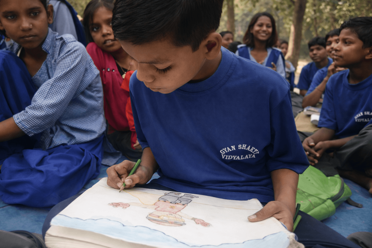 Student immersed in drawing
